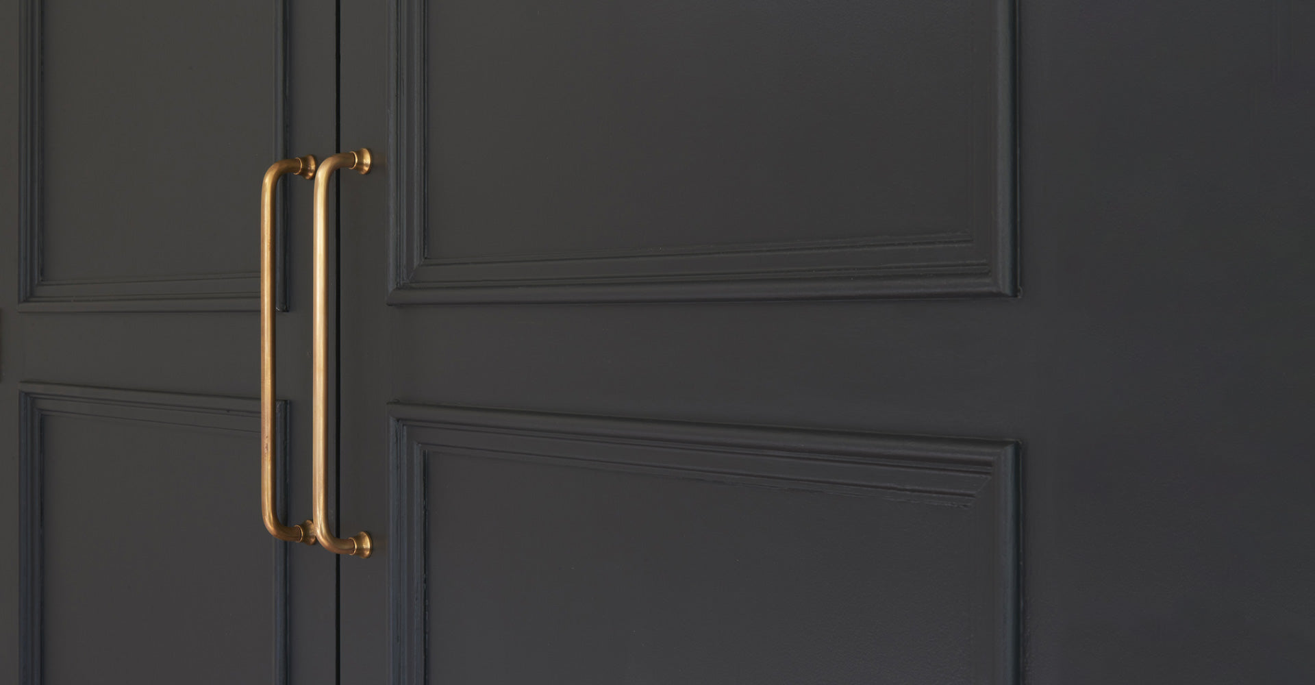 Antique Brass poplar mortice door knob on black door